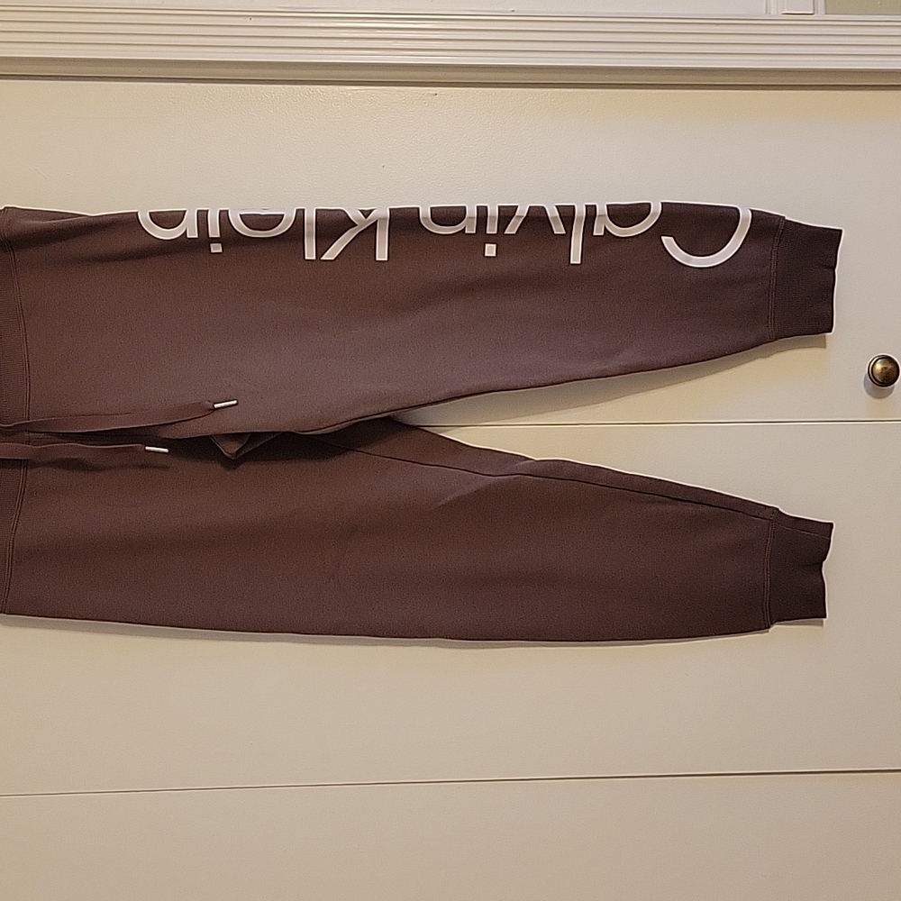 Calvin Klein sweatpants. Color: Purple brown. Size: M